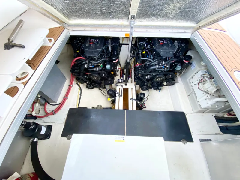 Slide: The Image of 2006 Chaparral Signature 350 engine compartment with dual engines and clean layout. - 43