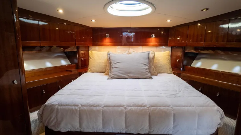 Slide: The Image of Luxurious bedroom interior of 2008 Savannah 54 yacht with elegant wood finish. - 10