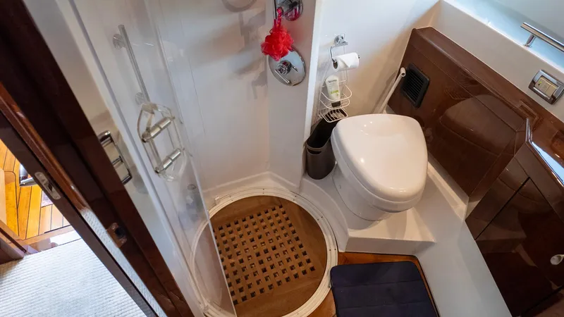 Slide: The Image of Compact bathroom in 2008 Savannah 54 yacht with shower and toilet. - 13