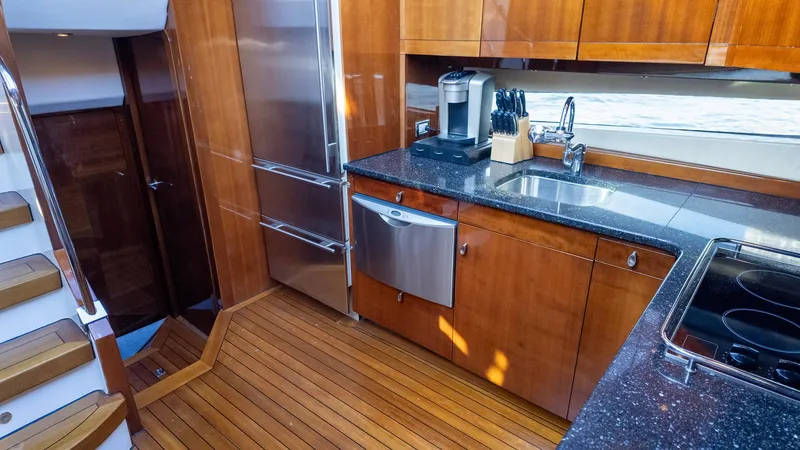 Slide: The Image of Luxurious kitchen in 2008 Savannah 54 yacht with wood flooring and modern appliances. - 20