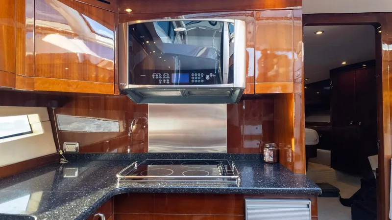Slide: The Image of Luxurious kitchen interior of 2008 Savannah 54 yacht with modern appliances and sleek design. - 24