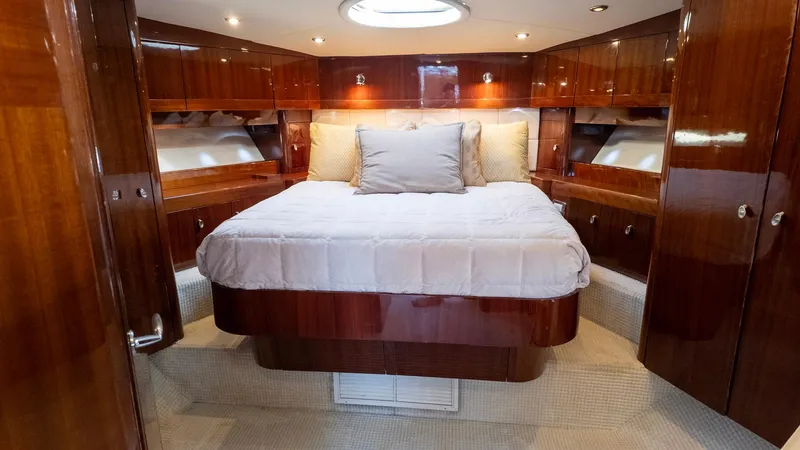 Slide: The Image of Luxurious cabin interior of 2008 Savannah 54 yacht with polished wood finish. - 9
