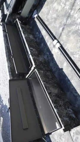 Slide: The Image of 2025 Excel Boats Viper F4 1751 storage compartments and interior view. - 8