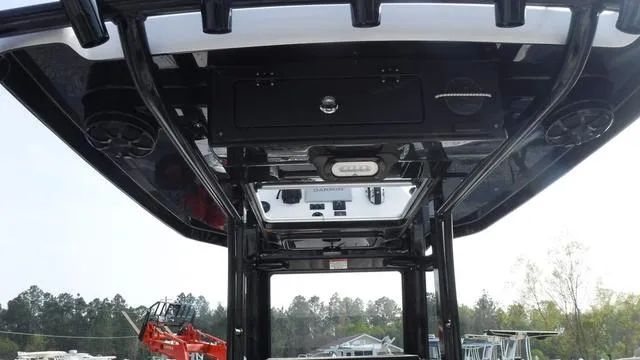 Slide: The Image of 2023 Blue Wave 2800 Makaira boat interior with advanced control panel and sleek design. - 41