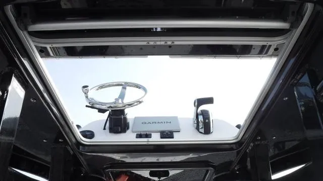 Slide: The Image of 2023 Blue Wave 2800 Makaira boat helm with Garmin navigation system. - 43