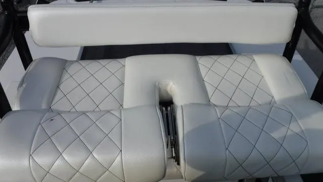 Slide: The Image of 2023 Blue Wave 2800 Makaira boat seat with diamond-stitched white upholstery. - 47