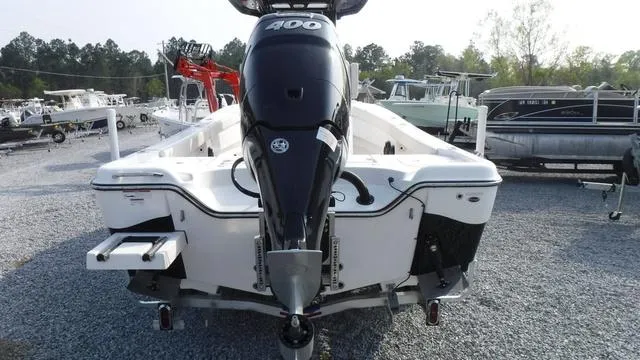 Slide: The Image of 2023 Blue Wave 2800 Makaira boat with powerful 400 engine, displayed outdoors. - 7