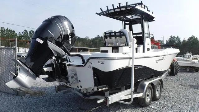 Slide: The Image of 2023 Blue Wave 2800 Makaira boat on trailer with powerful Mercury outboard engine. - 8