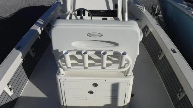 Slide: The Image of 2024 Pathfinder 2600 TRS boat interior with rod holders and seating. - 14