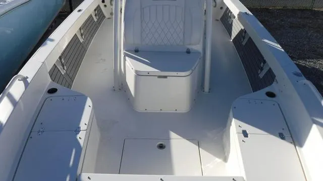 Slide: The Image of 2024 Pathfinder 2600 TRS boat interior with seating and storage compartments. - 23