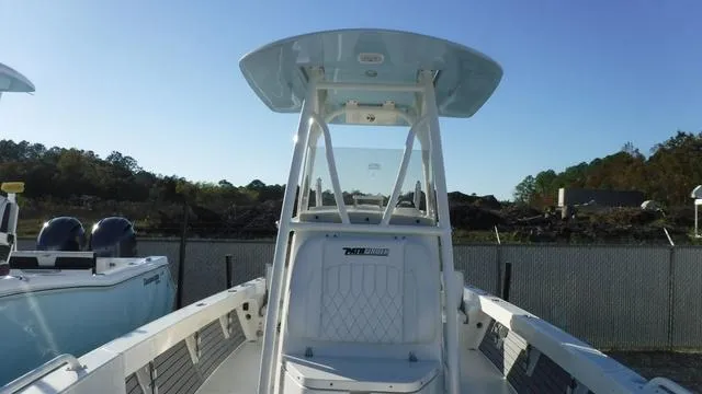 Slide: The Image of 2024 Pathfinder 2600 TRS boat with T-top and spacious deck. - 24