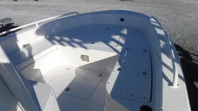 Slide: The Image of 2024 Pathfinder 2600 TRS boat interior with spacious deck and storage compartments. - 7