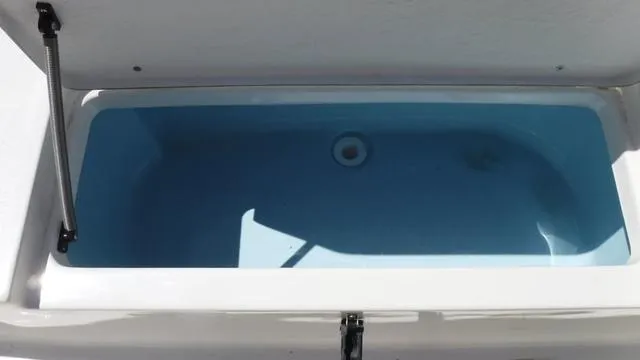 Slide: The Image of Open storage compartment on 2024 Bulls Bay 2200 boat. - 19