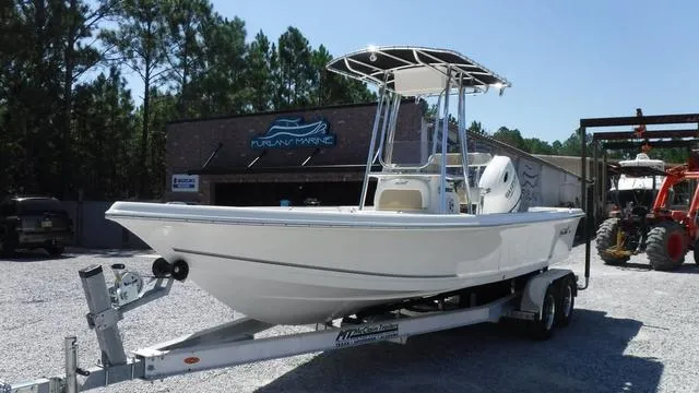 Slide: The Image of 2024 Bulls Bay 2200 boat on trailer at dealership, ready for adventure. - 4
