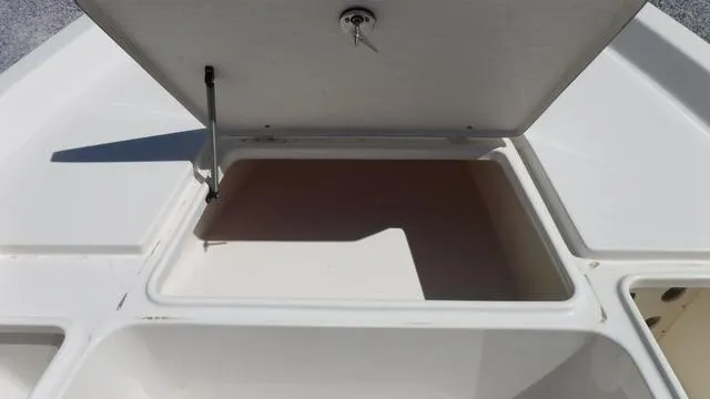 Slide: The Image of Open storage compartment on 2024 Bulls Bay 2200 boat. - 8