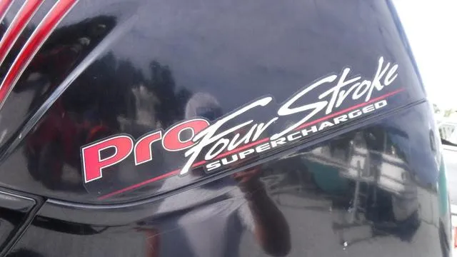 Slide: The Image of Pro Four Stroke Supercharged engine on 2013 ShearWater 25 Bay boat. - 13