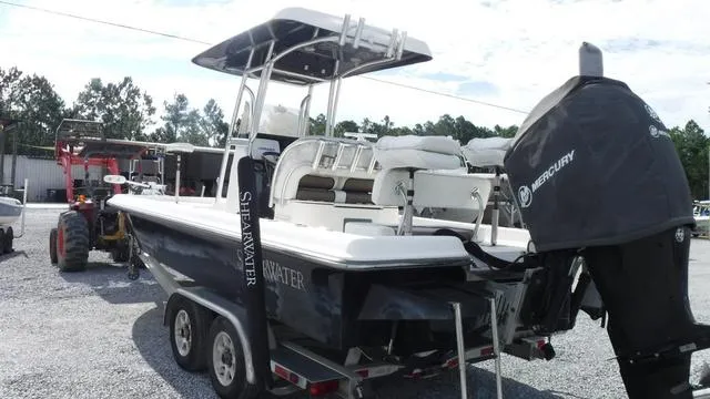 Slide: The Image of 2013 ShearWater 25 Bay boat with Mercury engine on trailer. - 4