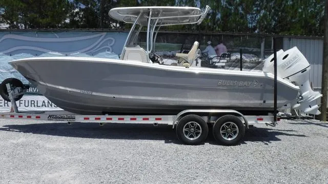 Slide: The Image of 2025 Bulls Bay 255 CC boat on trailer, side view. - 1