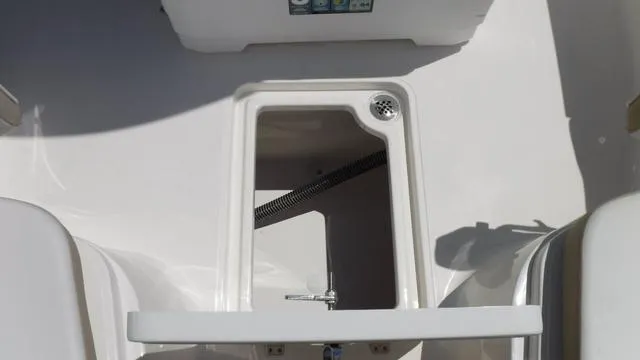 Slide: The Image of 2025 Bulls Bay 255 CC boat interior compartment detail. - 17