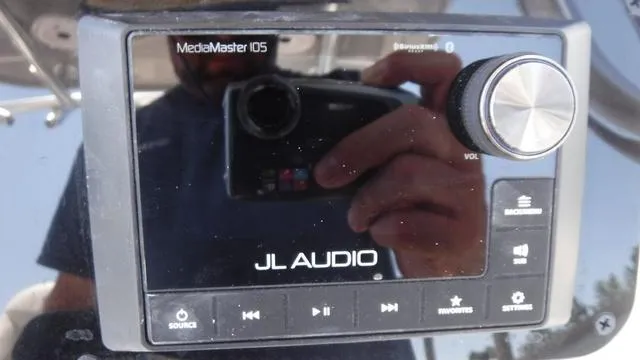 Slide: The Image of JL Audio MediaMaster 105 control panel on 2025 Bulls Bay 255 CC boat. - 20