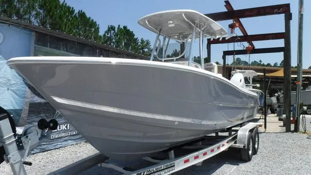 Slide: The Image of 2025 Bulls Bay 255 CC boat on trailer in outdoor setting. - 4
