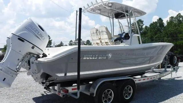 Slide: The Image of 2025 Bulls Bay 255 CC boat on trailer, featuring sleek design and powerful engine. - 5