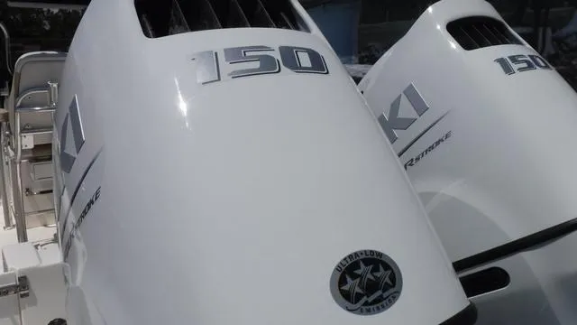 Slide: The Image of Twin Suzuki 150 outboard engines on a 2025 Bulls Bay 255 CC boat. - 7