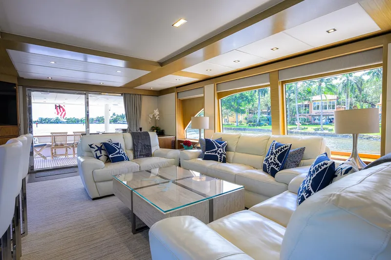 Slide: The Image of Luxurious interior of 2018 Hargrave 100 Raised Pilothouse yacht with elegant seating and large windows. - 21
