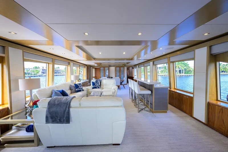 Slide: The Image of Luxurious interior of 2018 Hargrave 100 Raised Pilothouse yacht with elegant seating and large windows. - 22