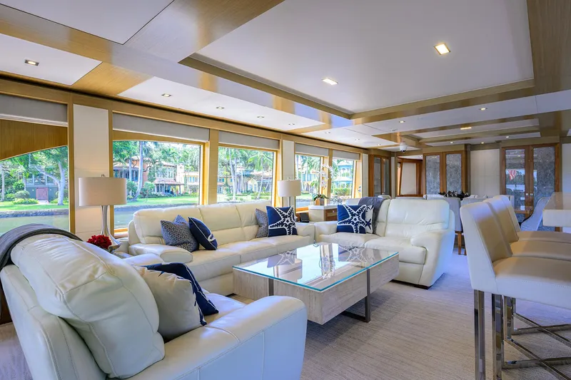 Slide: The Image of Luxurious interior of 2018 Hargrave 100 Raised Pilothouse yacht with elegant seating and large windows. - 24