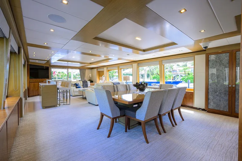 Slide: The Image of Luxurious interior of 2018 Hargrave 100 Raised Pilothouse yacht with elegant dining area. - 27
