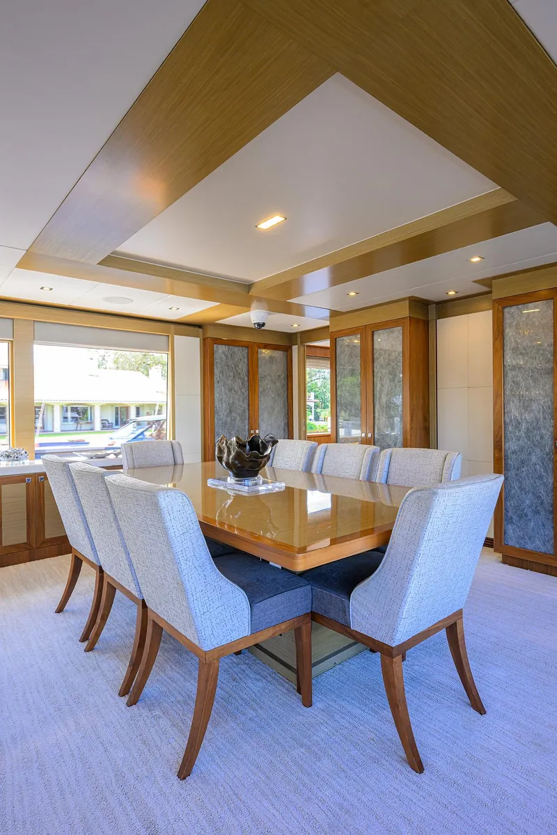 Slide: The Image of Luxurious dining area in 2018 Hargrave 100 Raised Pilothouse yacht with elegant furnishings. - 29