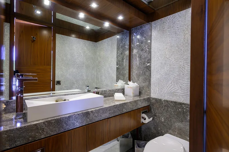 Slide: The Image of Luxurious bathroom in 2018 Hargrave 100 Raised Pilothouse yacht with modern fixtures and elegant design. - 30
