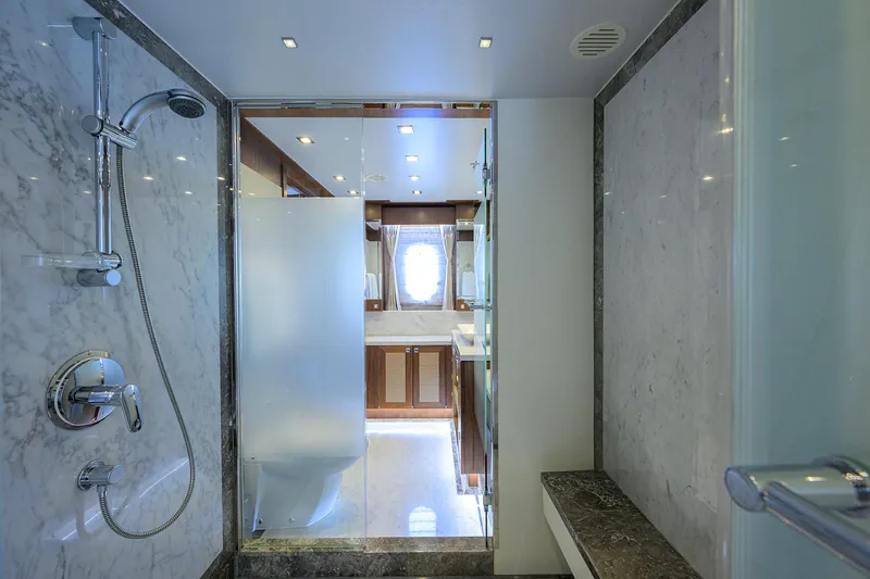 Slide: The Image of Luxurious bathroom in 2018 Hargrave 100 Raised Pilothouse yacht with marble shower. - 49