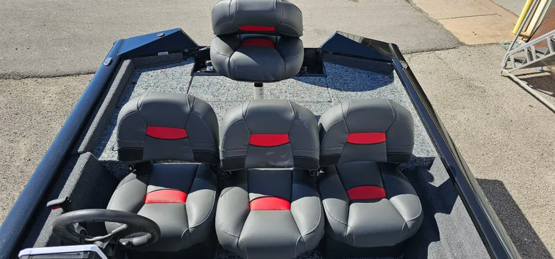 Slide: The Image of 2025 Tracker Pro Team 175 Crappie Edition boat with gray and red seating. - 5