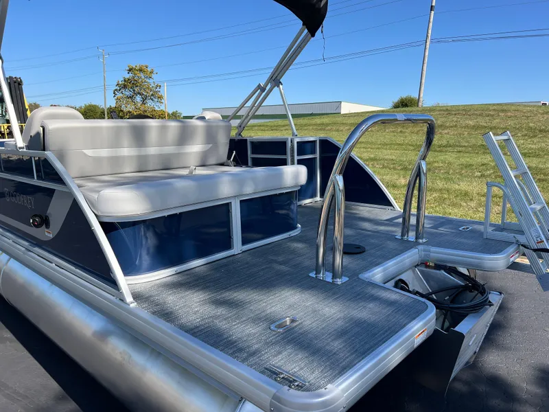 Slide: The Image of 2025 Godfrey Xperience 2286 SFL pontoon boat with spacious seating and sleek design. - 4