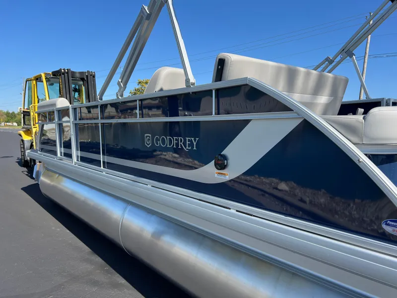 Slide: The Image of 2025 Godfrey Xperience 2286 SFL pontoon boat on a sunny day. - 5