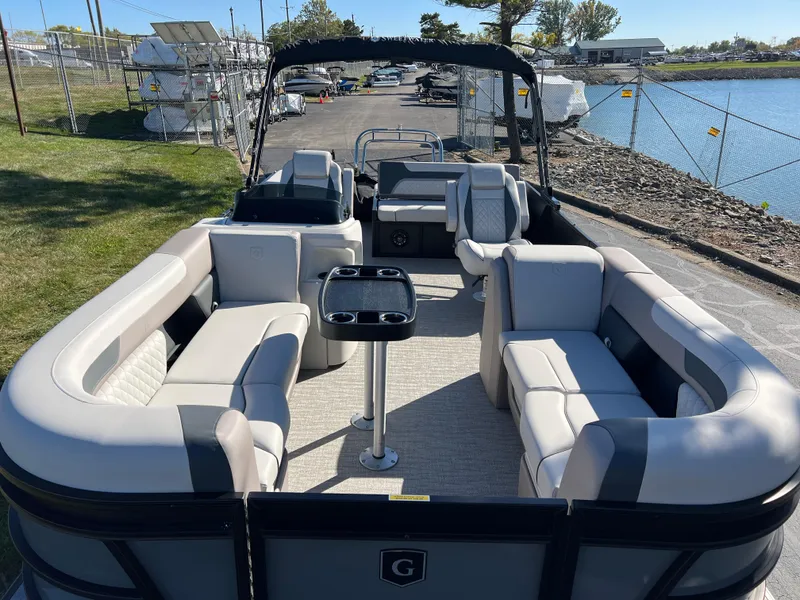 Slide: The Image of 2025 Godfrey SWEETWATER 2286 SFL pontoon boat with spacious seating and modern design. - 10