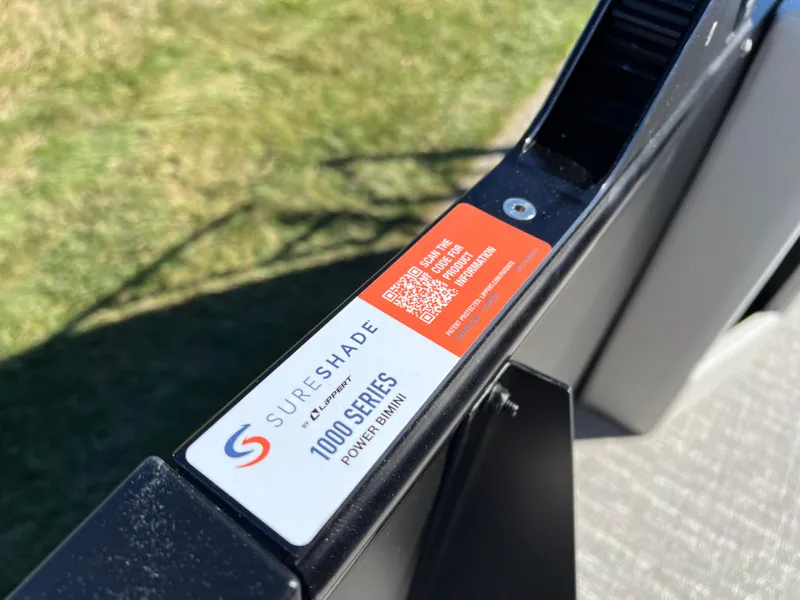 Slide: The Image of SureShade 1000 Series power bimini on 2025 Godfrey SWEETWATER 2286 SFL boat. - 23