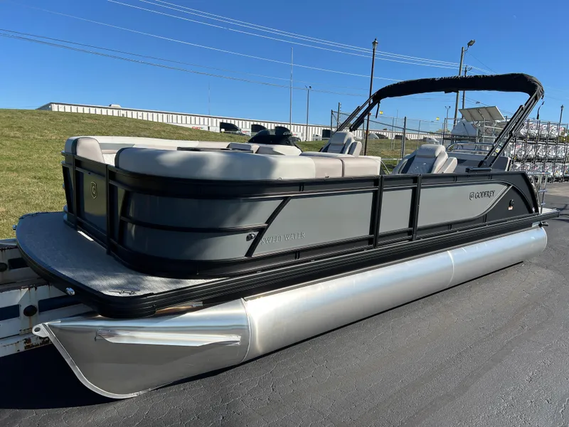 Slide: The Image of 2025 Godfrey SWEETWATER 2286 SFL pontoon boat with sleek design on display. - 6