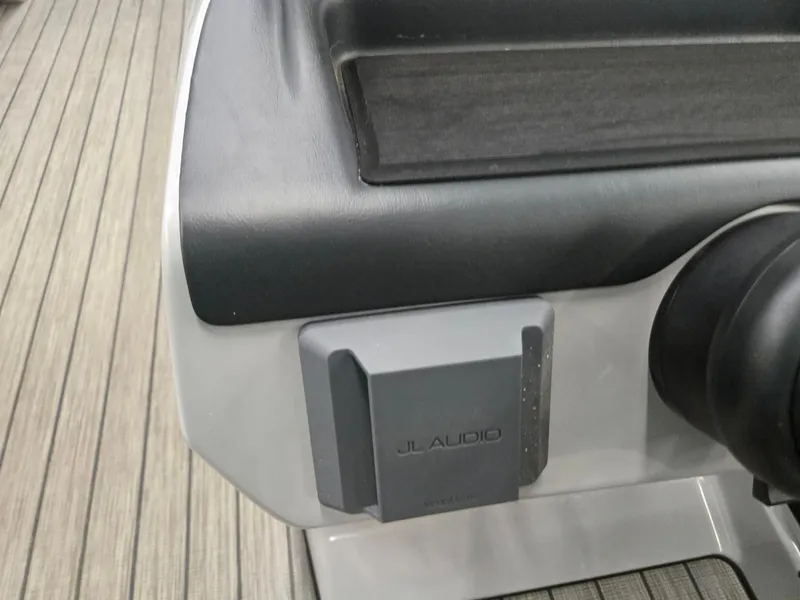 Slide: The Image of 2024 Harris Cruiser 230 dashboard featuring JL Audio component. - 15