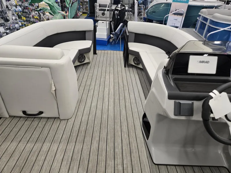 Slide: The Image of 2024 Harris Cruiser 230 interior with spacious seating and modern design. - 24