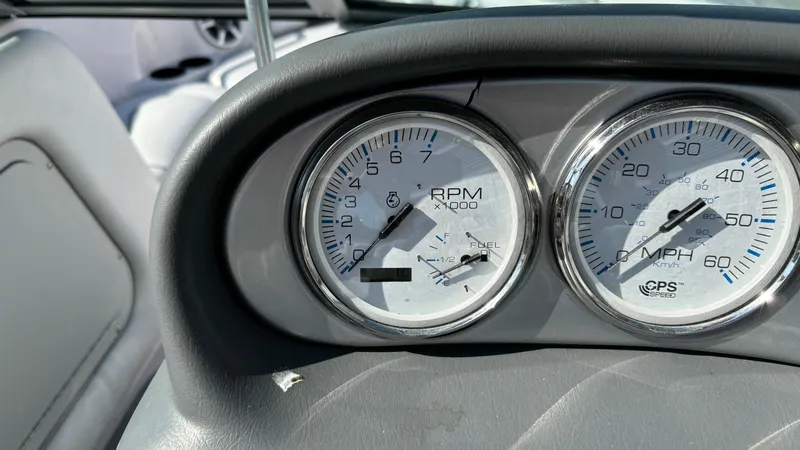 Slide: The Image of Dashboard gauges of 2005 Correct Craft SV211 Nautique Air boat. - 18