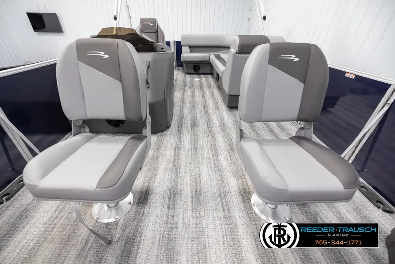 Slide: The Image of 2025 Bennington 188 SSSE boat interior with gray seating and modern design. - 13