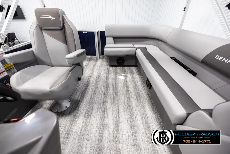 Slide: The Image of Interior of 2025 Bennington 188 SSSE boat with plush seating and modern design. - 14