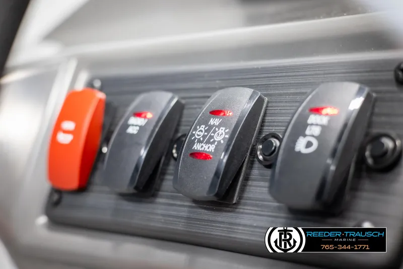 Slide: The Image of Control panel of 2025 Bennington 188 SSSE boat with labeled switches. - 27