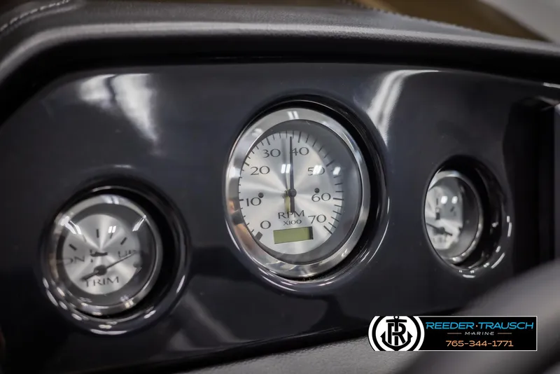 Slide: The Image of Dashboard gauges of 2025 Bennington 188 SSSE boat, featuring RPM and trim indicators. - 29