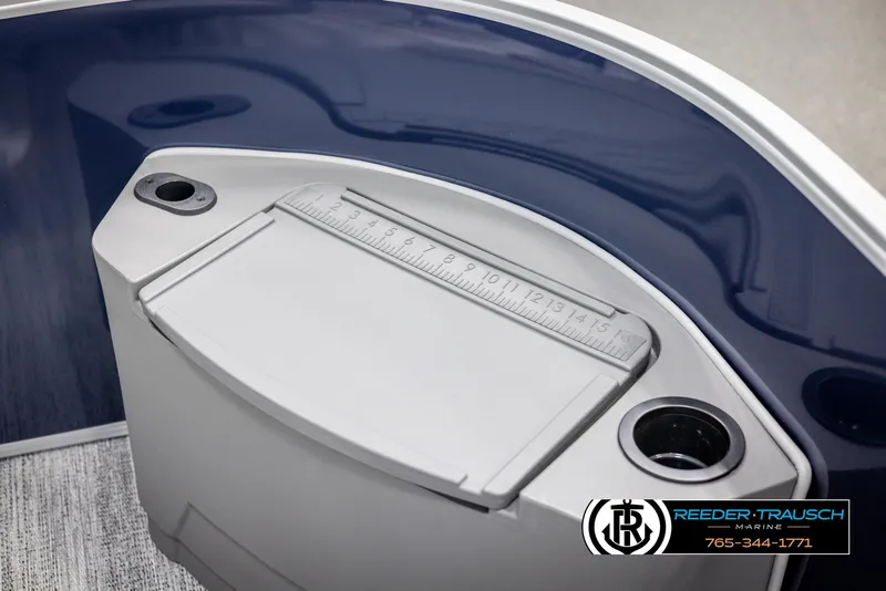 Slide: The Image of 2025 Bennington 188 SSSE boat detail with built-in ruler and cup holders. - 36