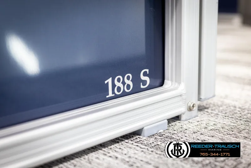 Slide: The Image of Close-up of 2025 Bennington 188 SSSE boat detail with Reeder Trausch Marine logo. - 40