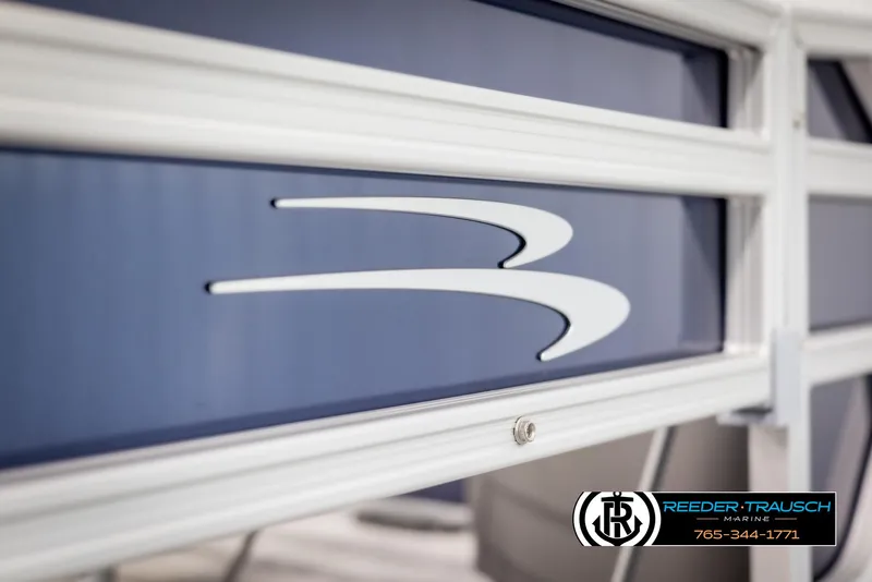 Slide: The Image of 2025 Bennington 188 SSSE boat detail with logo, Reeder-Trausch Marine branding. - 41